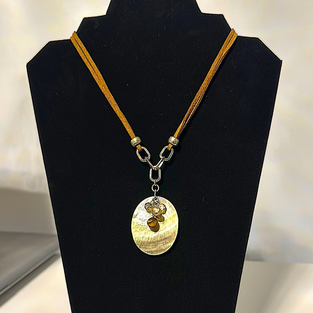 Double leather strand necklace with glass bead and shell charm